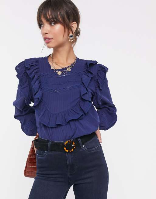 ASOS DESIGN - Top a maniche lunghe con volant e inserti in pizzo