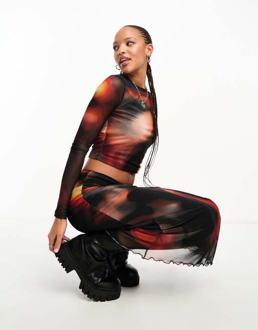ASOS DESIGN - Top a maniche lunghe in rete con stampa di fiamme in coordinato 
