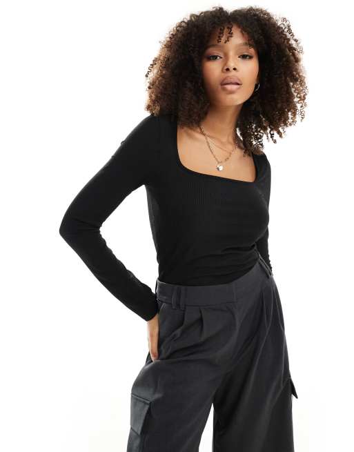 ASOS DESIGN - Top a maniche lunghe nero a coste con scollo rotondo