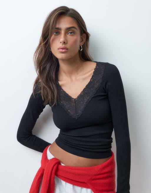 ASOS DESIGN top a maniche lunghe senza cuciture con scollo a V e dettagli in pizzo nero, 1 di 5