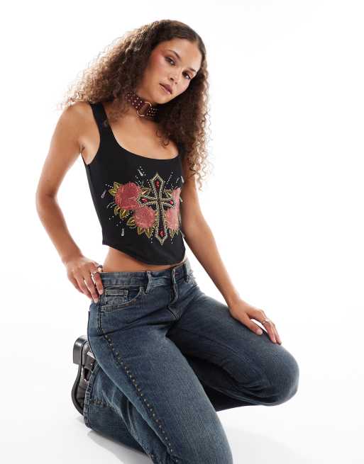 ASOS DESIGN - Top à taille corsetée et gros ornements avec imprimé graphique - Noir