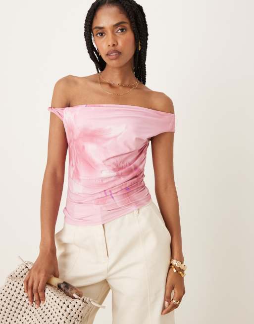 ASOS DESIGN - Top aderente con spalle scoperte e spallina incrociata con stampa a fiori oversize in coordinato