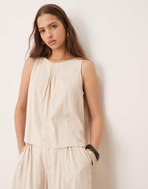 ASOS DESIGN - Top allacciato al collo color latticello a pieghe in coordinato