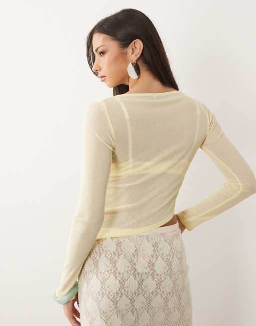 ASOS DESIGN - Top amarillo crema transparente de manga larga con bajo asimétrico, 3 de 4