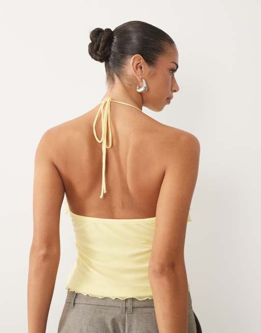 ASOS DESIGN - Top amarillo de tirantes con cuello halter y volantes de malla, 4 de 4