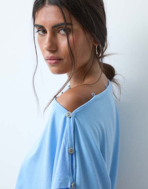ASOS DESIGN - Top azul claro multiposición con botones, 2 de 4