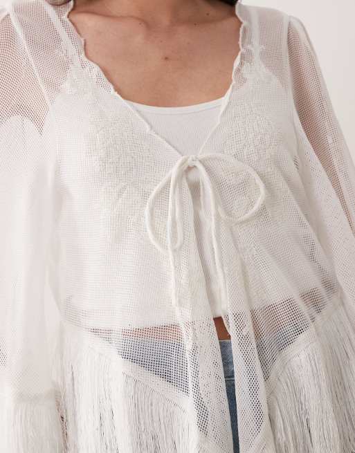 ASOS DESIGN - Top blanco transparente con lazada delantera, bordados y bajo de flecos, 3 de 4