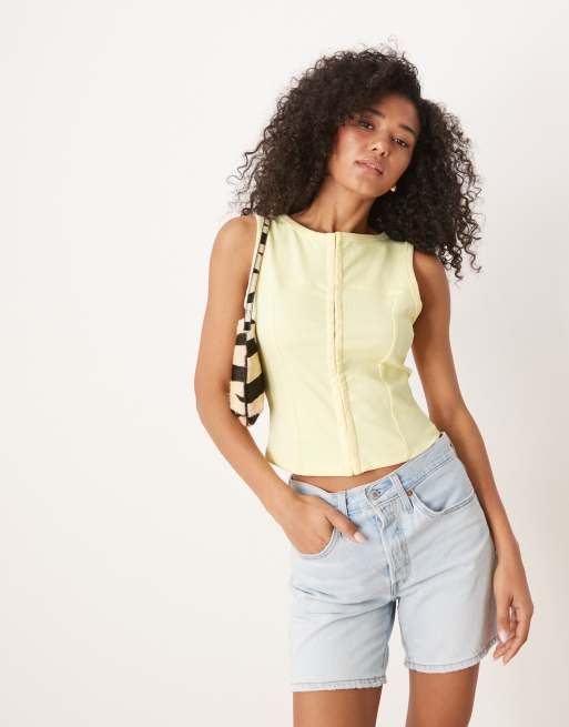 ASOS DESIGN - Top boutonné sans manches - Jaune pastel