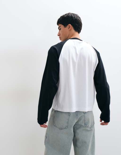 ASOS DESIGN top boxy extragrande con manga raglán larga en negro y blanco, 4 de 5