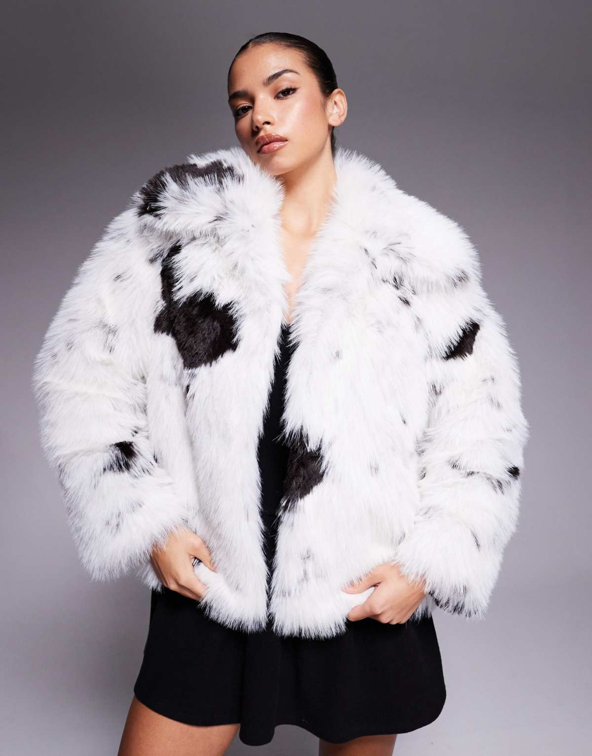 ASOS DESIGN top collar faux fur coat in cream and black cow print