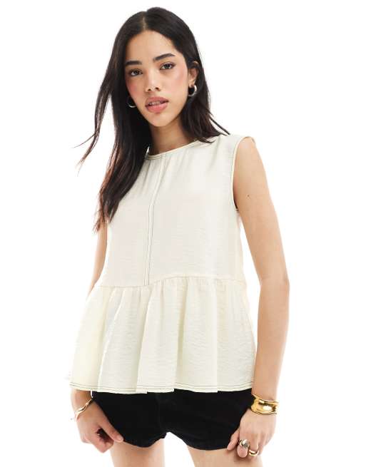 ASOS DESIGN - Top con peplo voluminoso color panna con cuciture a contrasto