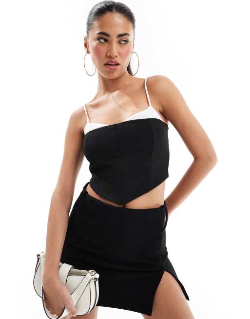 ASOS DESIGN - Top façon corset avec détail façon brassière apparente - Noir et blanc