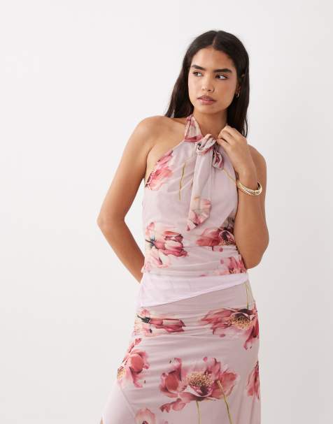 ASOS DESIGN - top halter con bajo abierto anudado de flores rosa - view 1