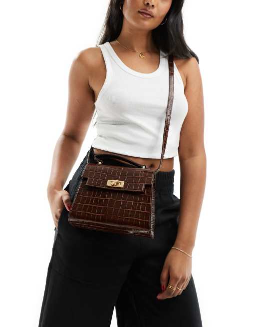 ASOS DESIGN top handle crossbody bag with twist lock in brown, 2 of 4