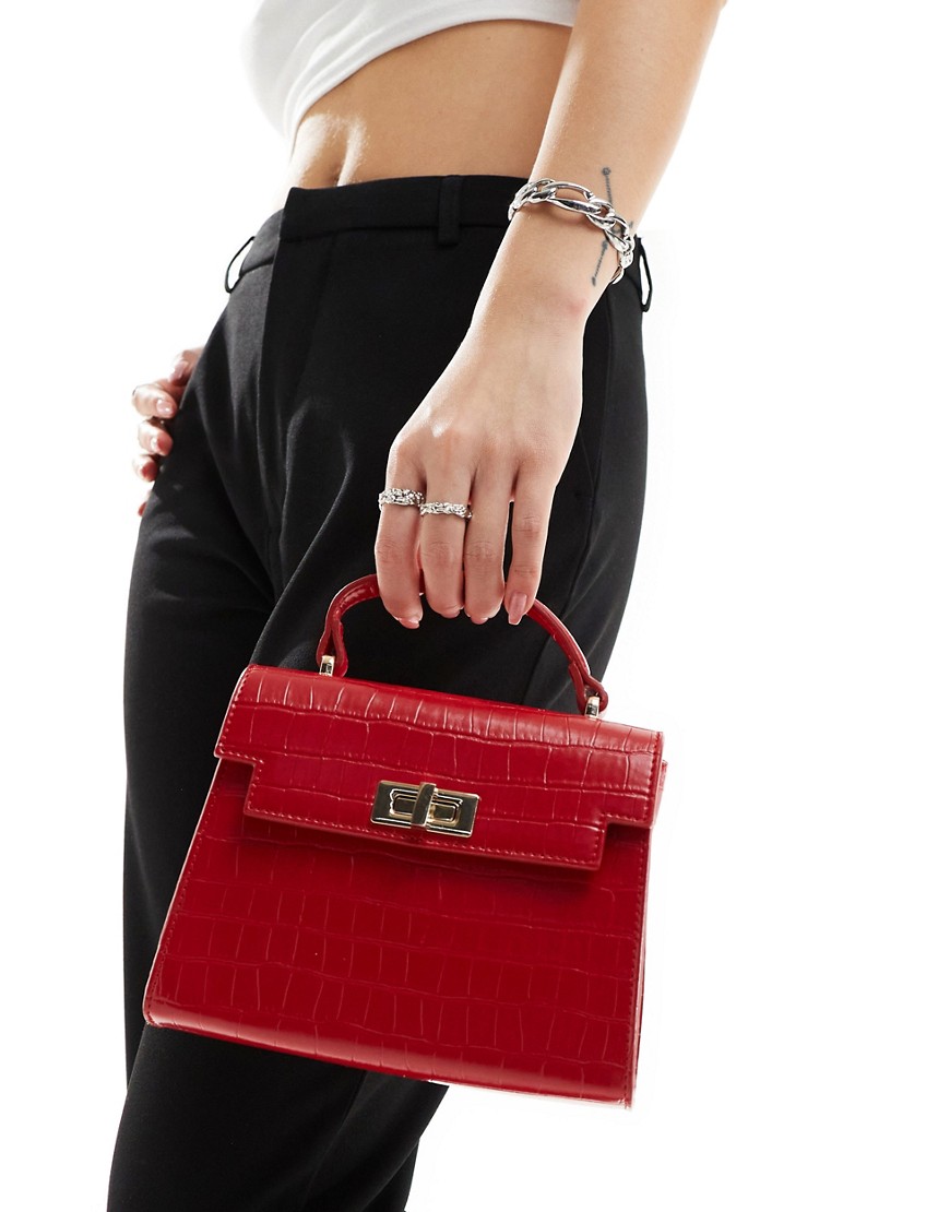 top handle crossbody bag with twist lock in red