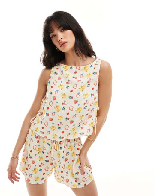 ASOS DESIGN - Top in lino con stampa di frutta e laccetti laterali in coordinato