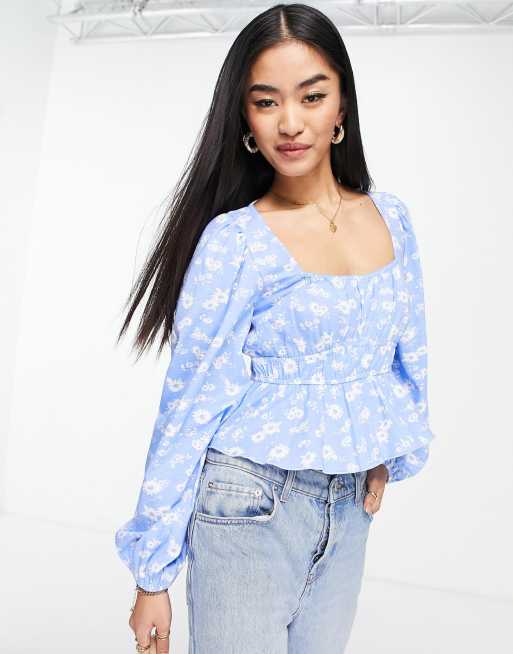 ASOS DESIGN - Top met gesmokte taille en lange mouwen in blauw met bloemenprint