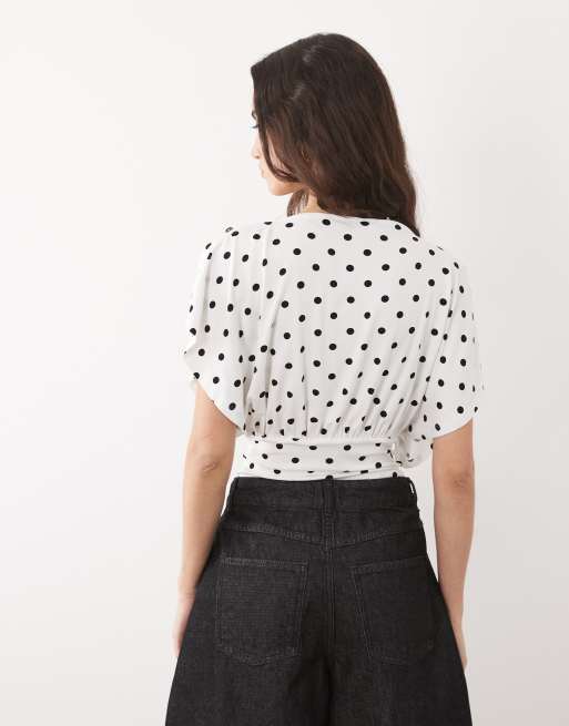 ASOS DESIGN - Top multiposizione a pois con bottoni, 4 di 4