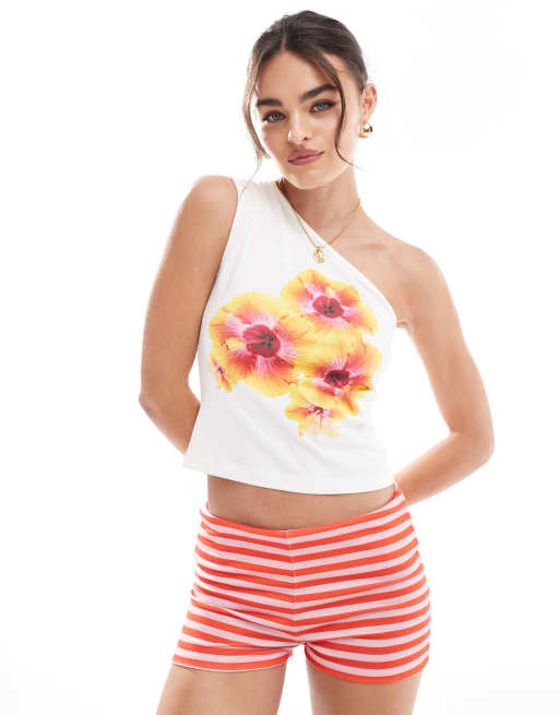 ASOS DESIGN – Top na jedno ramię w kolorze kości słoniowej z nadrukiem tropikalnych kwiatów