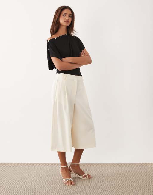 ASOS DESIGN - Top nero con bottoni multiposizione, 2 di 4