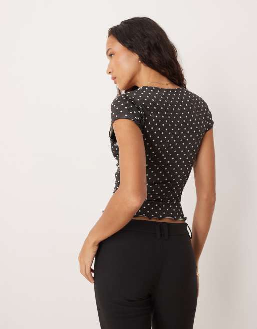 ASOS DESIGN - Top près du corps à pois avec col V et bords en dentelle - Noir et blanc, 3 de 4