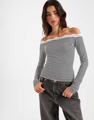 ASOS DESIGN - Top rayé à épaules dénudées et manches longues à bord en dentelle - Noir et blanc