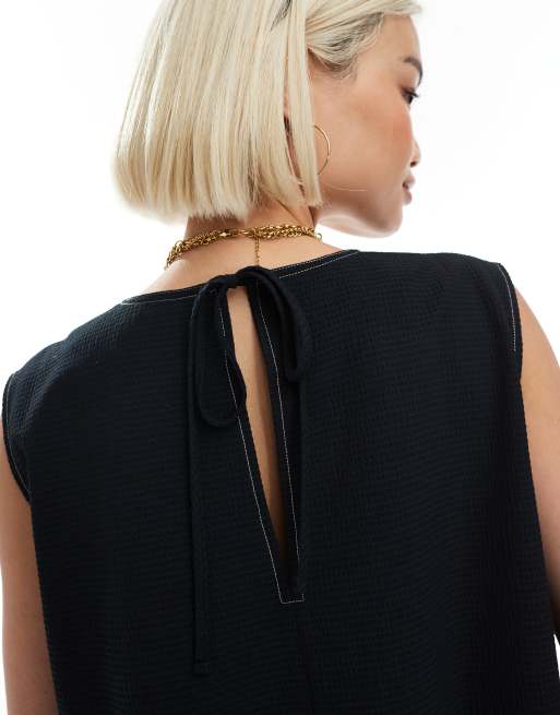 ASOS DESIGN - Top sans manches avec ourlet à basque volumineuse et coutures contrastantes - Noir, 3 de 4