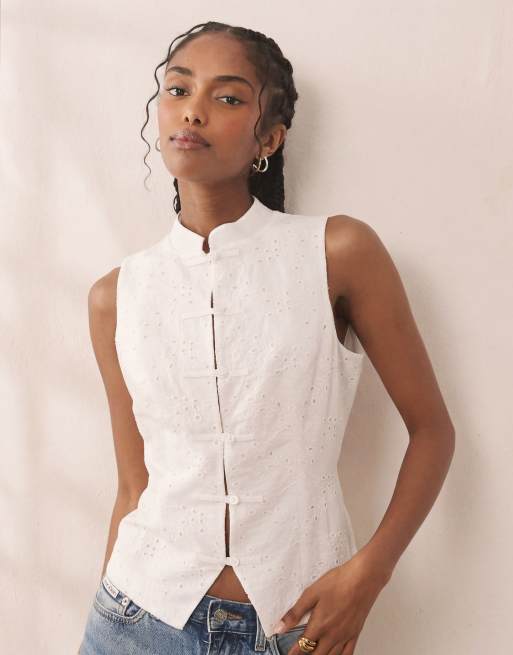 ASOS DESIGN - Top senza maniche in pizzo color avorio con colletto alla coreana