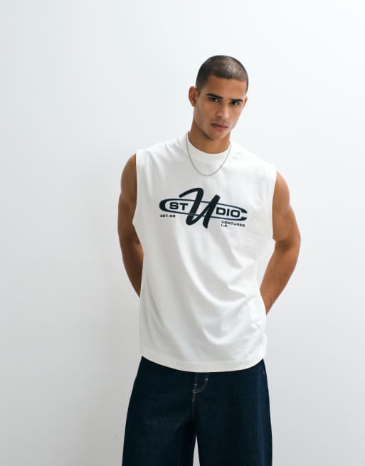 ASOS DESIGN - Top senza maniche oversize color crema con grafica Studio Ventures