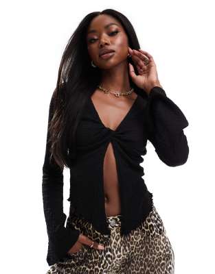 ASOS DESIGN - Top torsadé devant à manches longues évasées - Noir