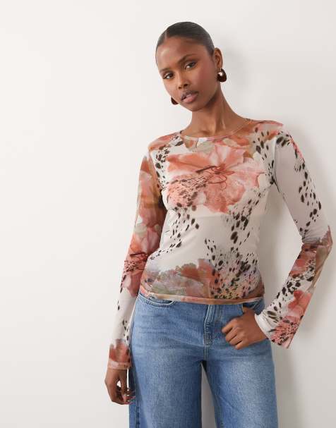 ASOS DESIGN - Top transparente de manga larga acampanada con estampado de flores y manchas de malla - view 1
