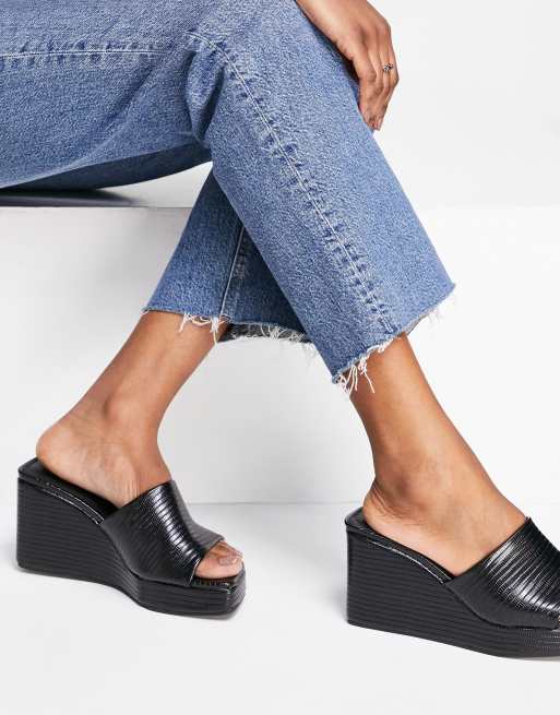 ASOS DESIGN Topaz square toe wedge mules in black