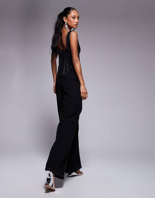 ASOS DESIGN – Strukturierter Jumpsuit in Schwarz mit Korsettdetail und Ziernaht