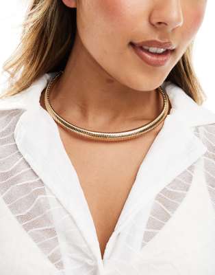 ASOS DESIGN torque choker with ribbed design in gold tone