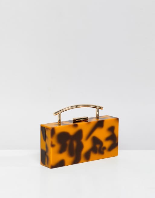 ASOS DESIGN marble clutch bag with metal handle