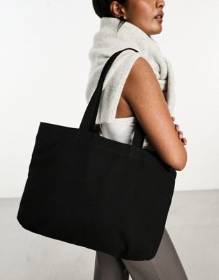 ASOS DESIGN laptop compartment canvas tote bag in black - BLACK - ASOS Price Checker