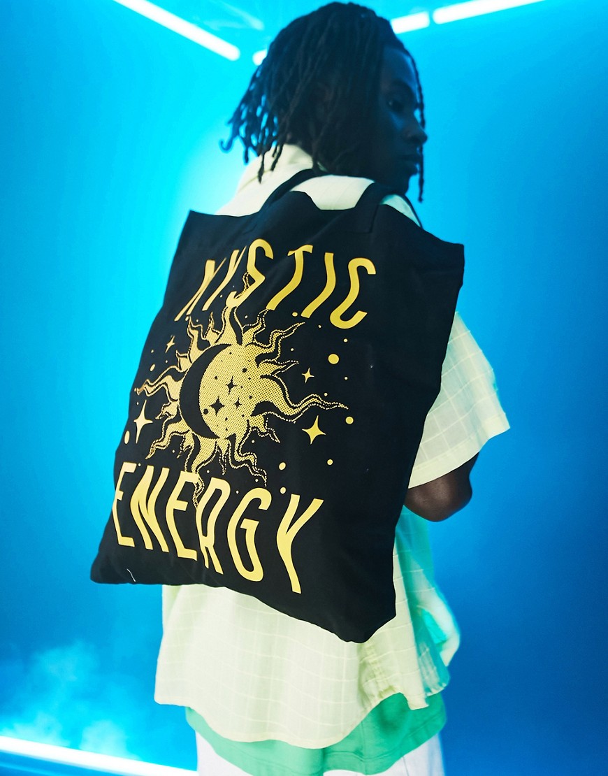 ASOS DESIGN tote bag in black with 'Mystic Energy' print