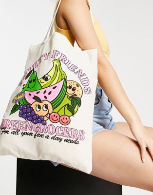 ASOS DESIGN tote bag with fruity friends print in natural