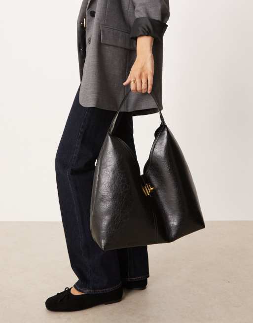 ASOS DESIGN tote bag with lock detail in black