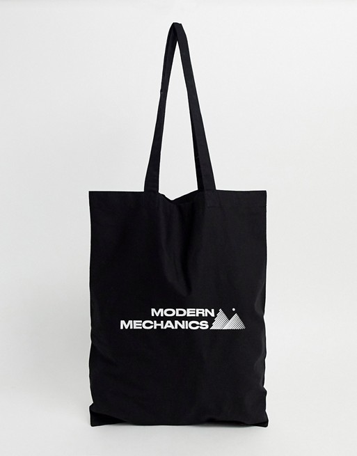 ASOS DESIGN tote bag in black organic cotton with white print