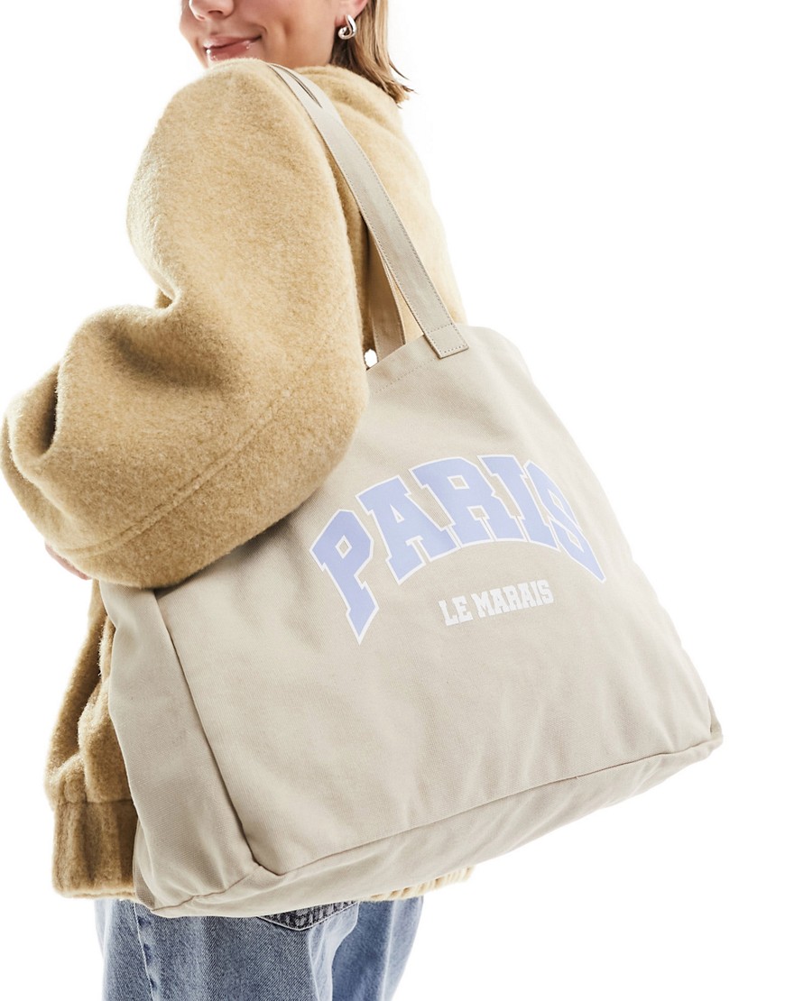 ASOS DESIGN tote bag with printed paris slogan in mink-Neutral