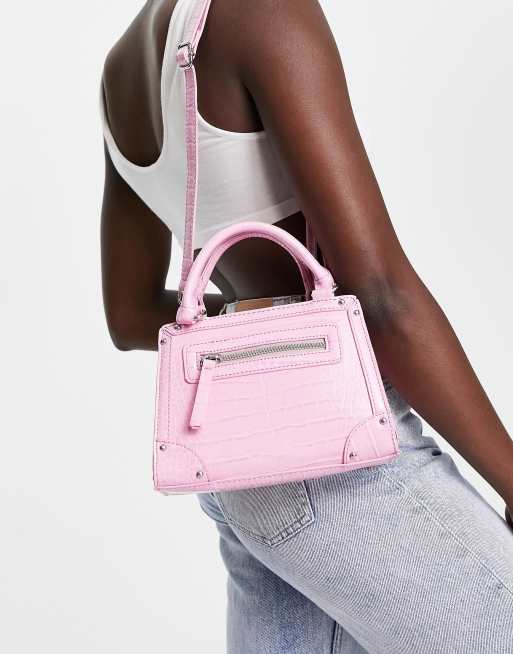 ASOS DESIGN - Tote met studs, zijstukken, afneembare crossbody band en hengsel aan de bovenkant in roze krok-effect