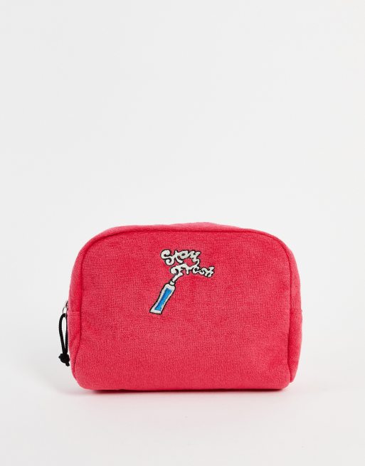 ASOS DESIGN towelling wash bag in red with embroidery