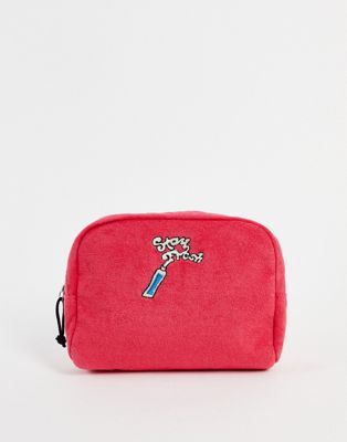 ASOS DESIGN towlling wash bag in red with embroidery