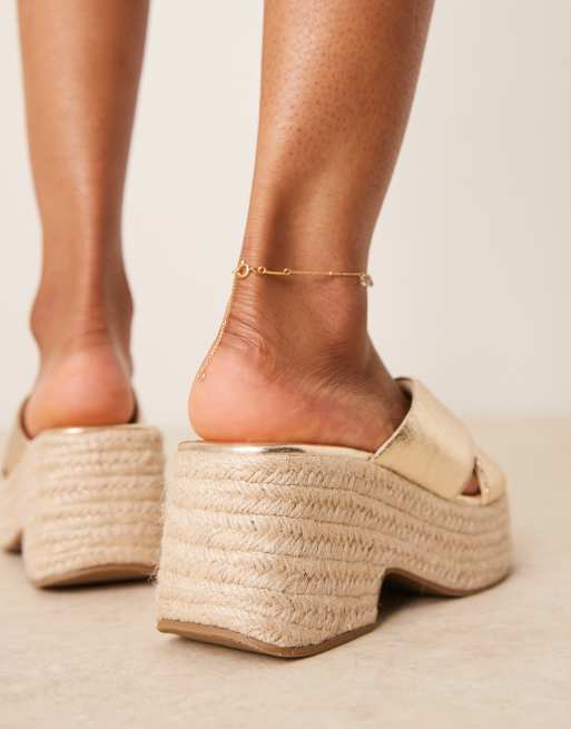 ASOS DESIGN Toy cross strap wedges in gold