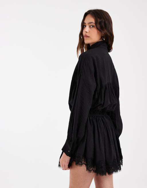 ASOS DESIGN track playsuit with lace hem in black, 3 of 4