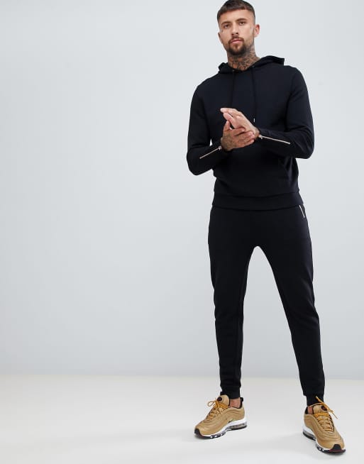 ASOS DESIGN tracksuit hoodie/skinny jogger in black with rose gold zips