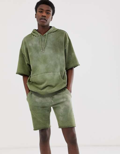 ASOS DESIGN tracksuit hoodie skinny shorts with raw hems in khaki acid wash