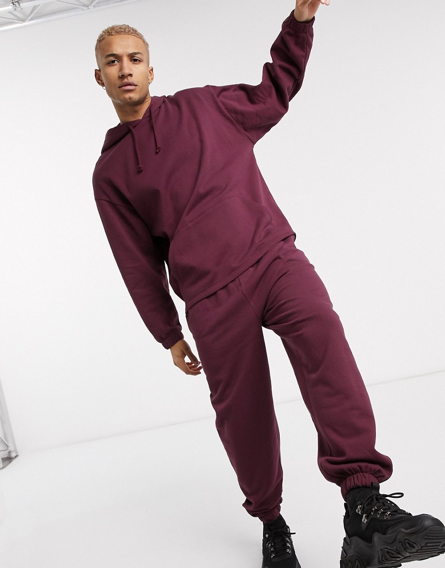 ASOS DESIGN tracksuit oversized hoodie / oversized joggers in burgundy-Red