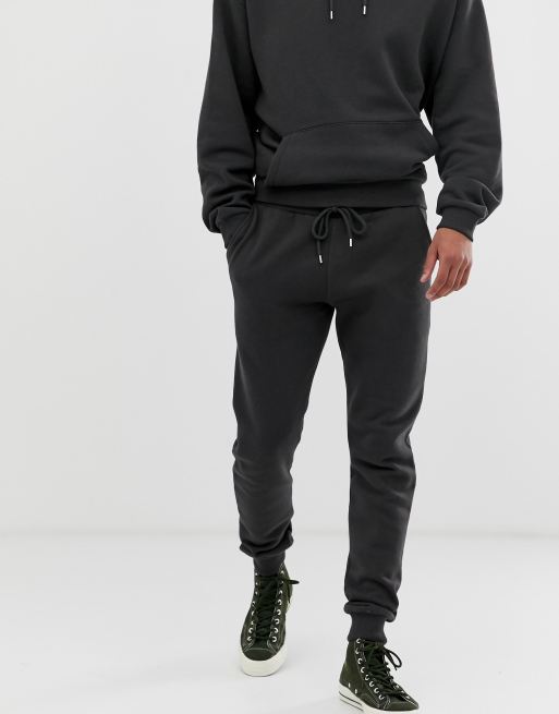 ASOS DESIGN organic tracksuit with oversized hoodie & oversized sweatpants  in black